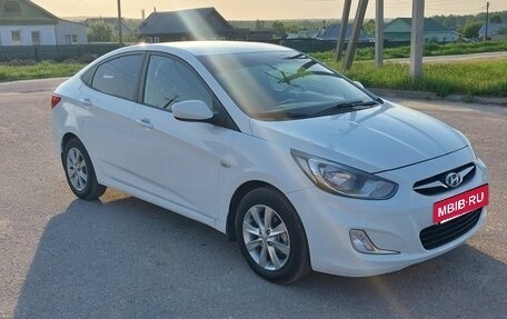 Hyundai Solaris II рестайлинг, 2011 год, 650 000 рублей, 2 фотография