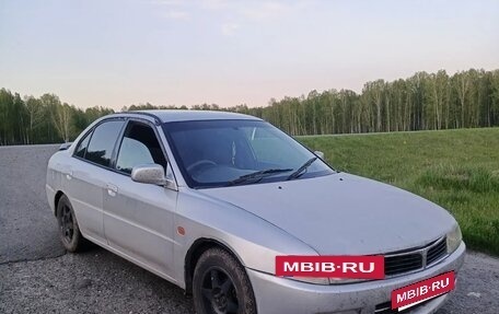 Mitsubishi Mirage VI рестайлинг, 1999 год, 170 000 рублей, 3 фотография