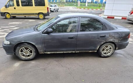Mazda Familia, 1997 год, 135 000 рублей, 3 фотография