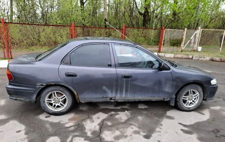 Mazda Familia, 1997 год, 135 000 рублей, 6 фотография