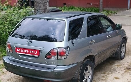 Lexus RX IV рестайлинг, 2001 год, 1 000 000 рублей, 4 фотография