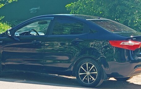 KIA Rio III рестайлинг, 2011 год, 590 000 рублей, 2 фотография