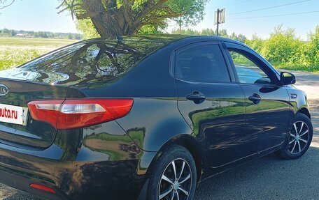 KIA Rio III рестайлинг, 2011 год, 590 000 рублей, 5 фотография