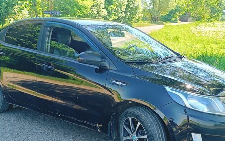 KIA Rio III рестайлинг, 2011 год, 590 000 рублей, 7 фотография