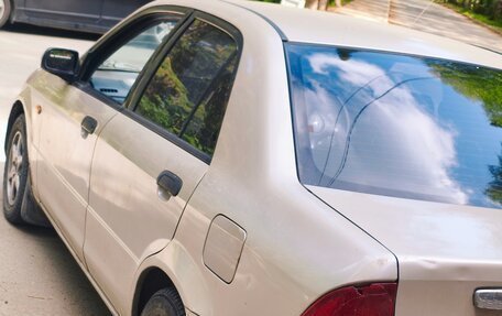 Ford Laser IV, 2000 год, 275 000 рублей, 6 фотография