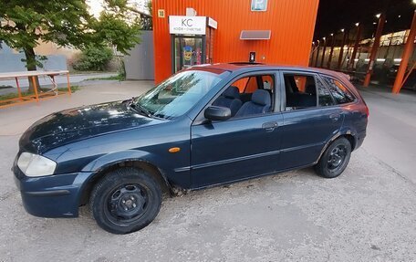 Mazda 323, 1999 год, 160 000 рублей, 2 фотография
