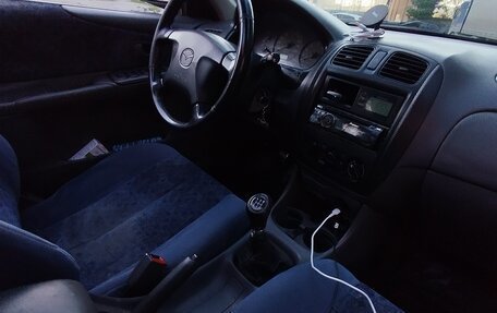 Mazda 323, 1999 год, 160 000 рублей, 10 фотография