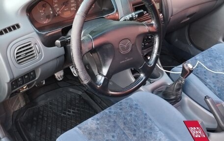 Mazda 323, 1999 год, 160 000 рублей, 9 фотография