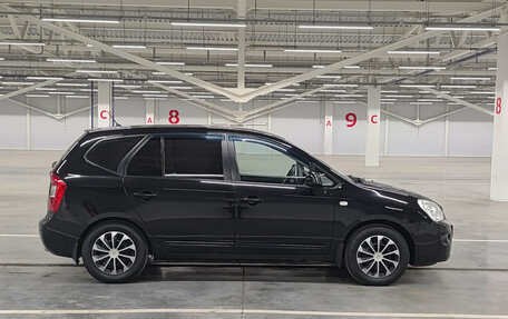 KIA Carens III (RP), 2011 год, 870 000 рублей, 4 фотография