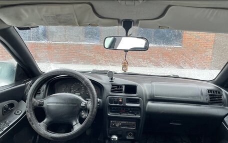 Mazda 323, 1998 год, 150 000 рублей, 10 фотография