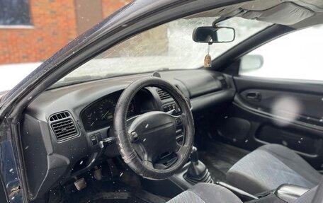 Mazda 323, 1998 год, 150 000 рублей, 11 фотография