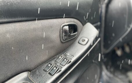 Mazda 323, 1998 год, 150 000 рублей, 12 фотография