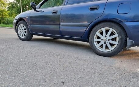 Mitsubishi Carisma I, 2001 год, 138 000 рублей, 18 фотография