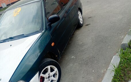 Mitsubishi Lancer VII, 1996 год, 65 000 рублей, 3 фотография