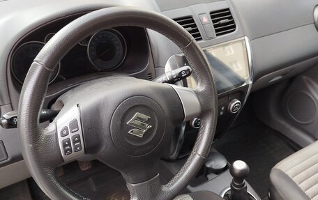 Suzuki SX4 II рестайлинг, 2013 год, 1 150 000 рублей, 23 фотография