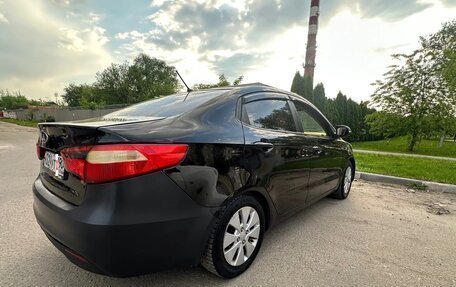 KIA Rio III рестайлинг, 2013 год, 570 000 рублей, 26 фотография