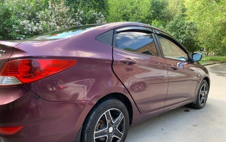 Hyundai Solaris II рестайлинг, 2011 год, 900 000 рублей, 11 фотография