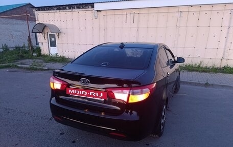 KIA Rio III рестайлинг, 2011 год, 650 000 рублей, 8 фотография