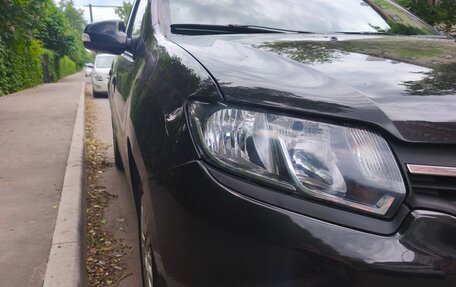 Renault Logan II, 2014 год, 640 000 рублей, 4 фотография