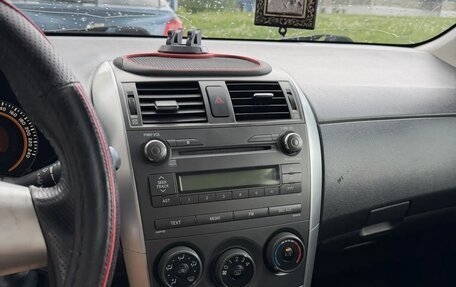 Toyota Corolla, 2011 год, 930 000 рублей, 7 фотография