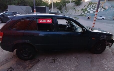 Mazda 323, 1999 год, 160 000 рублей, 4 фотография