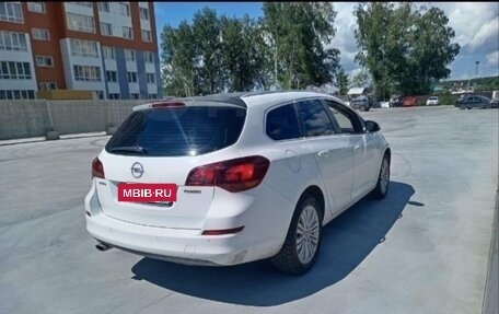 Opel Astra J, 2011 год, 590 000 рублей, 13 фотография