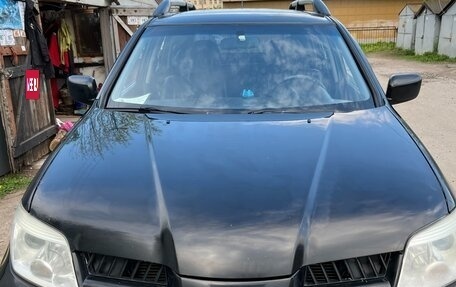 Mitsubishi Outlander III рестайлинг 3, 2007 год, 600 000 рублей, 2 фотография