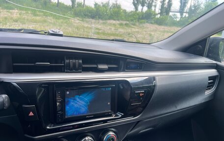 Toyota Corolla, 2014 год, 1 050 000 рублей, 12 фотография