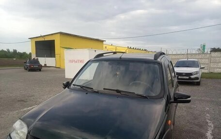 Chevrolet Niva I рестайлинг, 2012 год, 550 000 рублей, 3 фотография
