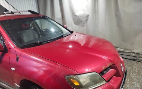 Mitsubishi Outlander III рестайлинг 3, 2003 год, 400 000 рублей, 32 фотография