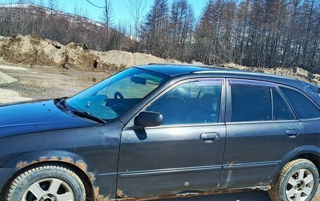 Mazda Familia, 1998 год, 170 000 рублей, 3 фотография