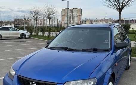 Mazda Familia, 2001 год, 550 000 рублей, 9 фотография