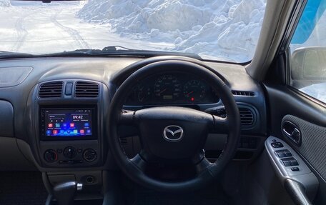 Mazda Familia, 2001 год, 350 000 рублей, 31 фотография
