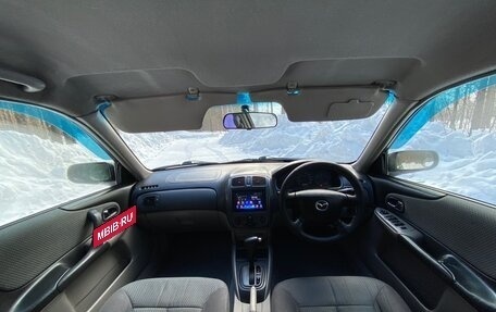 Mazda Familia, 2001 год, 350 000 рублей, 32 фотография