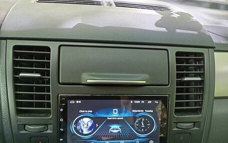 Nissan Tiida, 2010 год, 720 000 рублей, 14 фотография