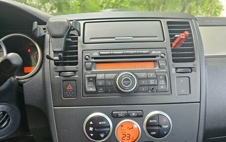 Nissan Tiida, 2010 год, 850 000 рублей, 11 фотография