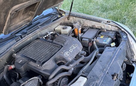 Toyota Land Cruiser Prado 120 рестайлинг, 2003 год, 12 фотография