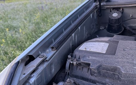 Toyota Land Cruiser Prado 120 рестайлинг, 2003 год, 13 фотография