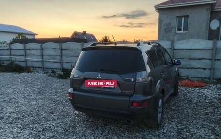 Mitsubishi Outlander III рестайлинг 3, 2010 год, 900 000 рублей, 2 фотография