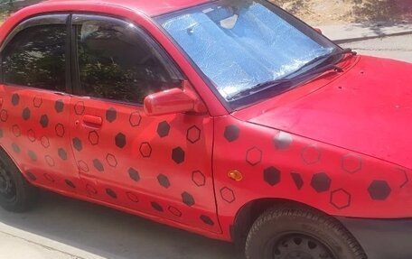 Mazda 121 II, 1993 год, 130 000 рублей, 4 фотография