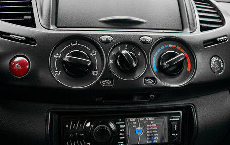 Mitsubishi L200 IV рестайлинг, 2013 год, 1 390 000 рублей, 16 фотография