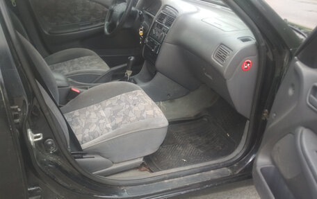 Toyota Avensis III рестайлинг, 1998 год, 165 000 рублей, 10 фотография