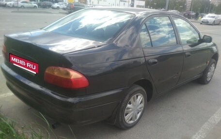 Toyota Avensis III рестайлинг, 1998 год, 165 000 рублей, 4 фотография