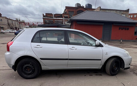 Toyota Corolla, 2004 год, 650 000 рублей, 9 фотография