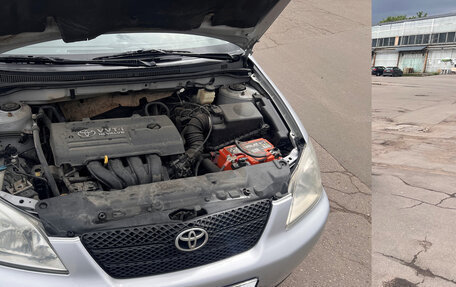 Toyota Corolla, 2004 год, 650 000 рублей, 8 фотография