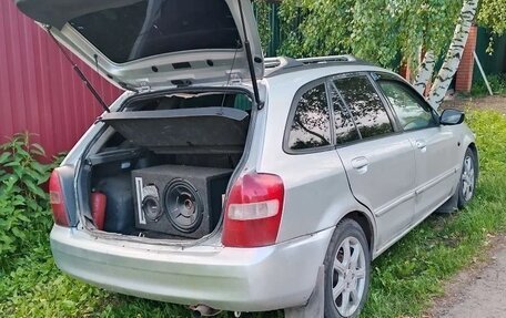 Mazda 323, 1999 год, 140 000 рублей, 3 фотография
