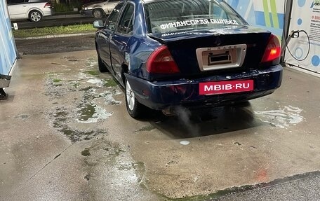 Mitsubishi Mirage VI рестайлинг, 2001 год, 60 000 рублей, 5 фотография