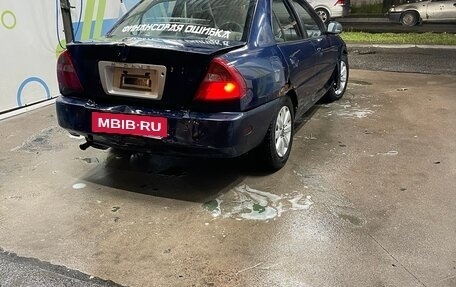 Mitsubishi Mirage VI рестайлинг, 2001 год, 60 000 рублей, 4 фотография