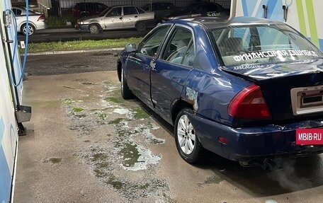 Mitsubishi Mirage VI рестайлинг, 2001 год, 60 000 рублей, 6 фотография
