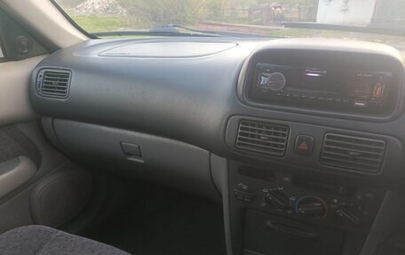 Toyota Sprinter VIII (E110), 1998 год, 300 000 рублей, 7 фотография